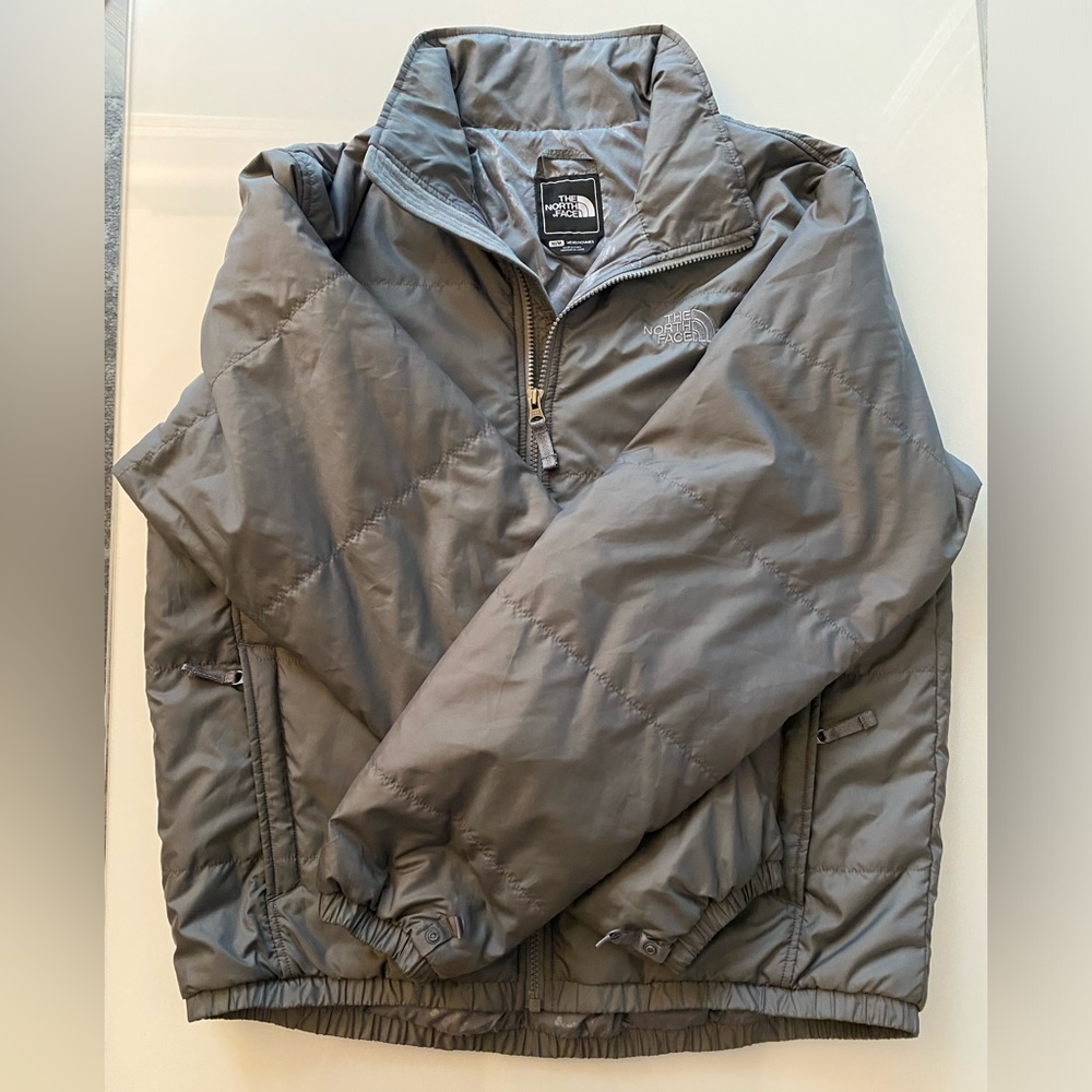 Men’s medium puffy North Face jacket.